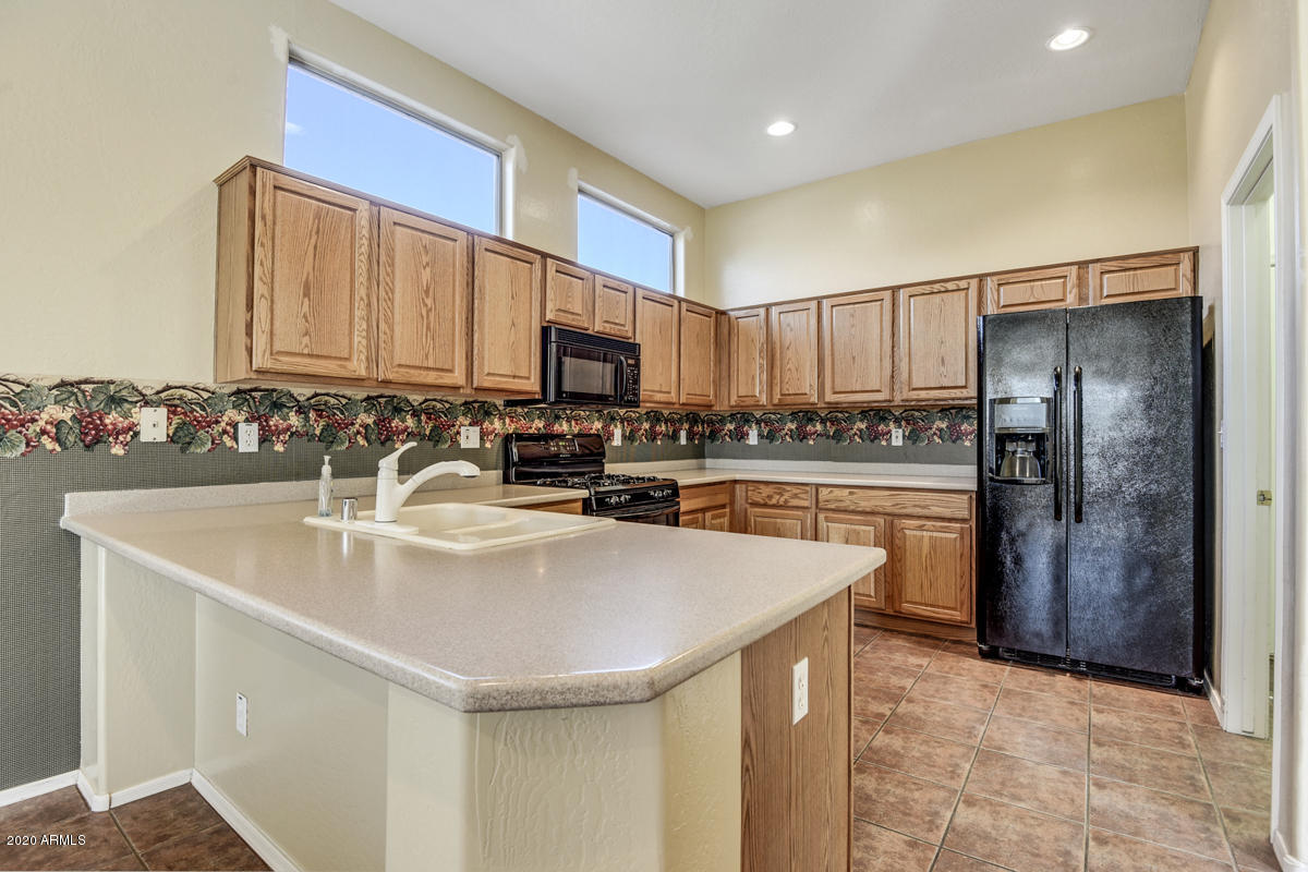 17461 West Wandering Creek Road Goodyear, AZ 85338 - Photo 3 of 41 9-Kitchen