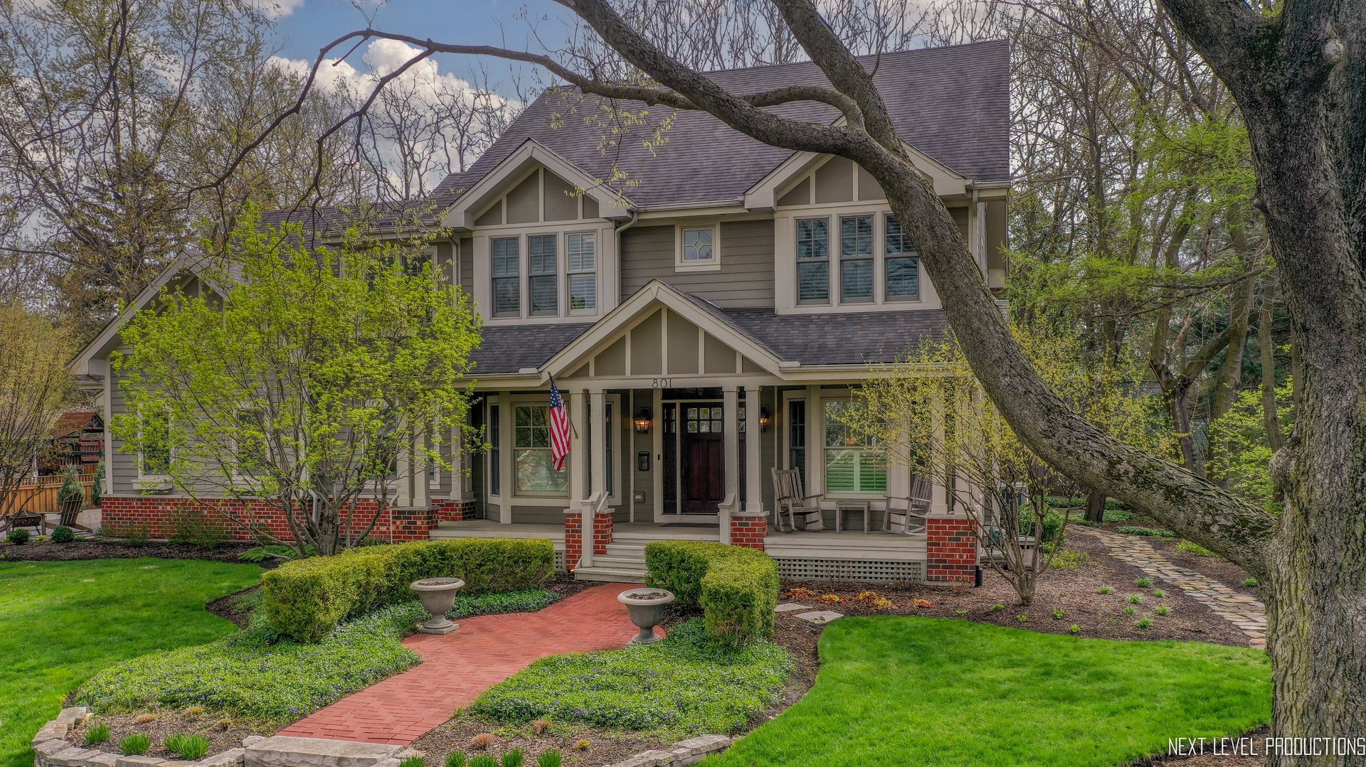 801 Meadows Road Geneva, IL 60134 - Photo 3 of 14 a front view of a house with garden