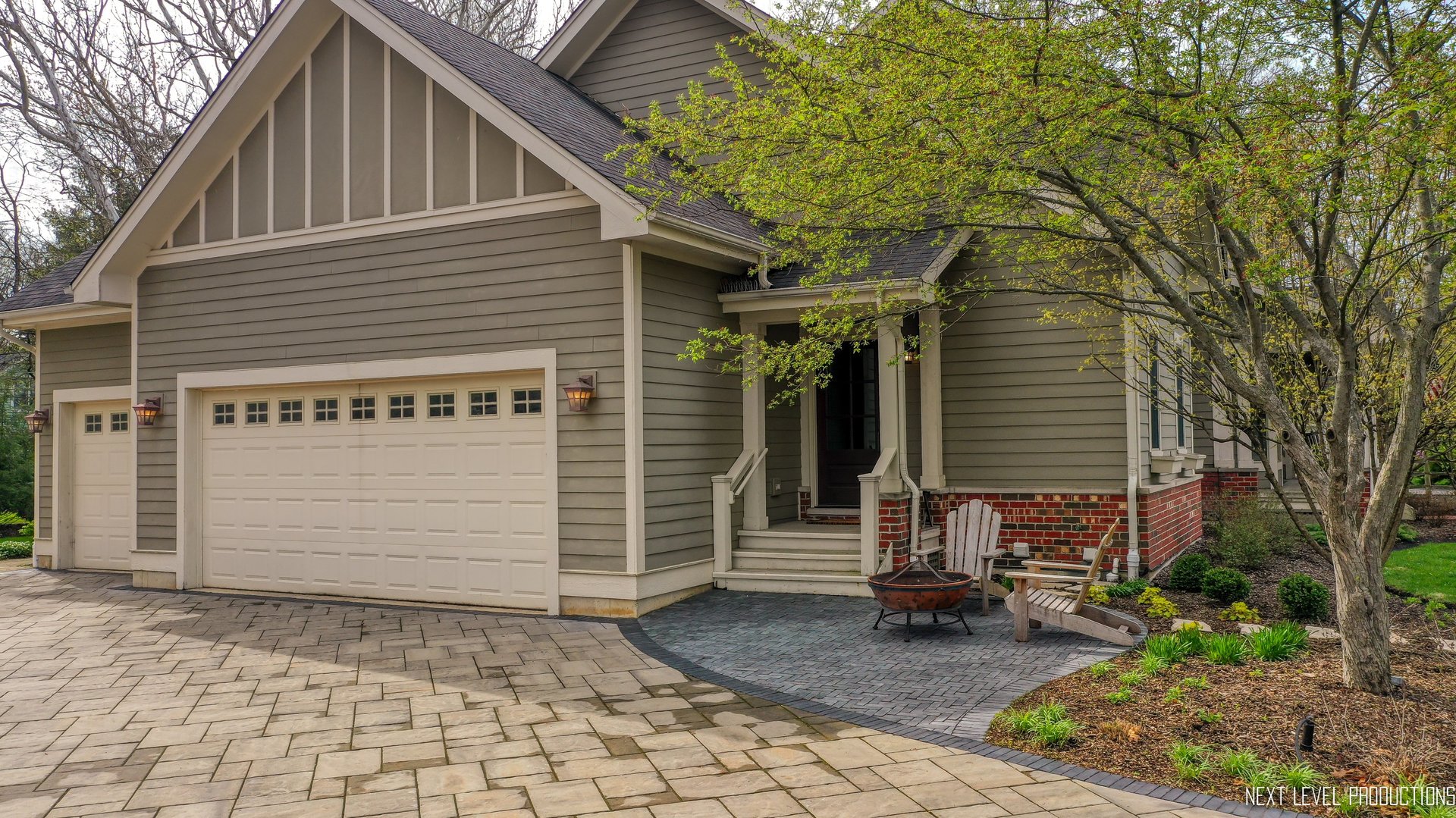 801 Meadows Road Geneva, IL 60134 - Photo 8 of 14 a front view of a house with garden