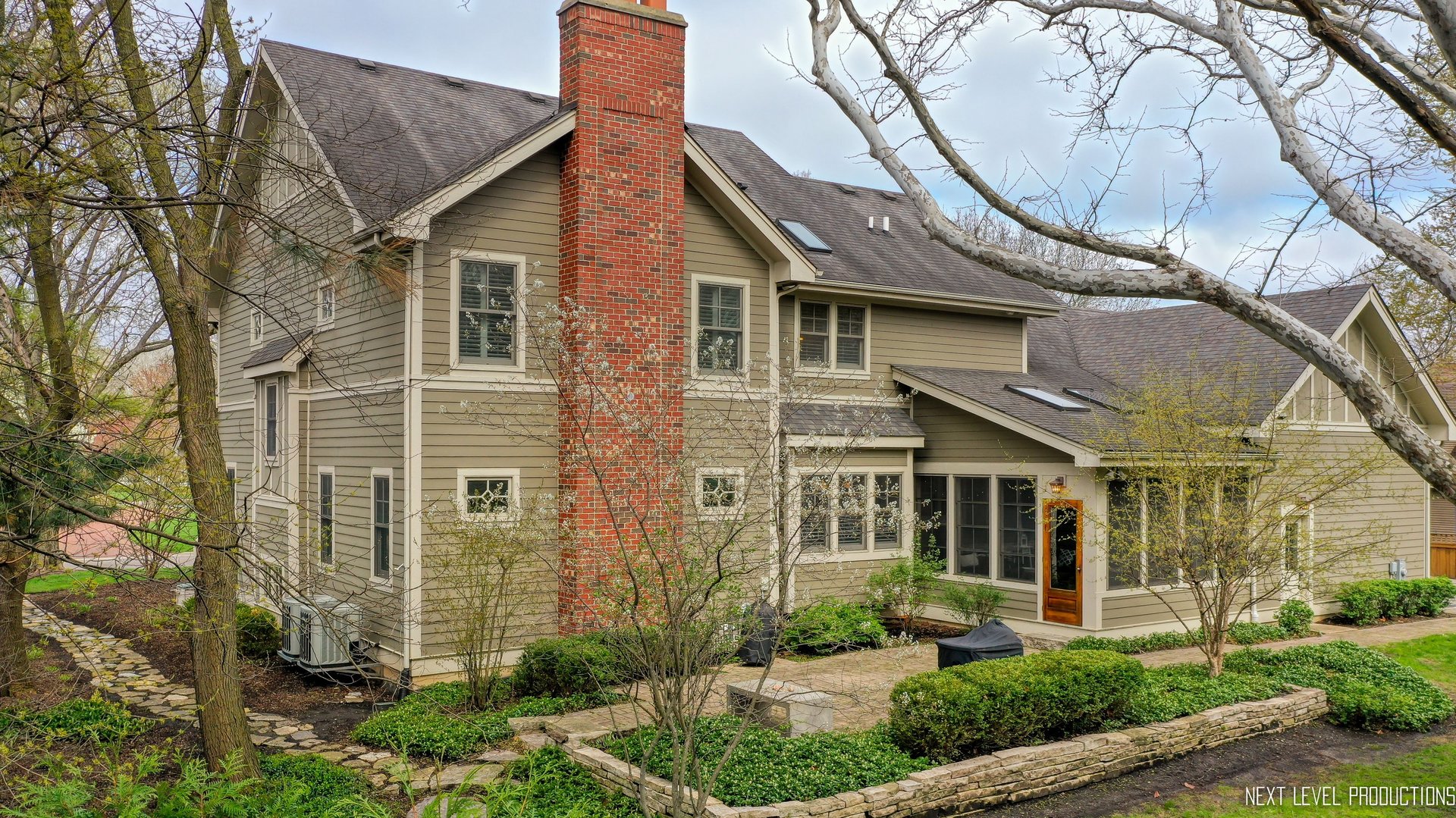 801 Meadows Road Geneva, IL 60134 - Photo 10 of 14 front view of a house with a yard