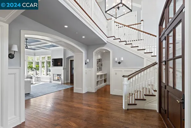 a kitchen with a stove a sink and a refrigerator