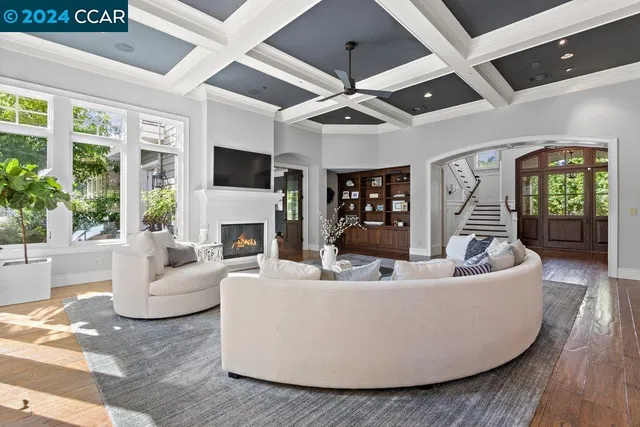 a kitchen with a counter space a sink appliances and cabinets