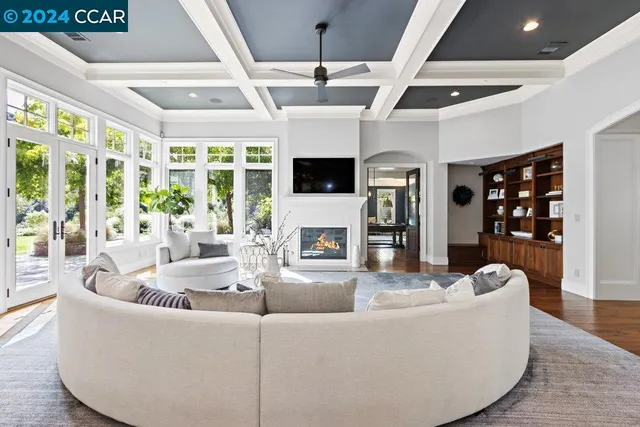 a balcony with furniture and a potted plant