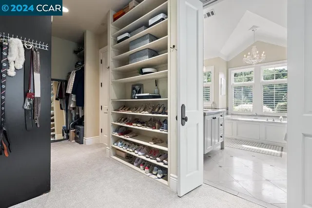 a building outdoor space with patio furniture and garden