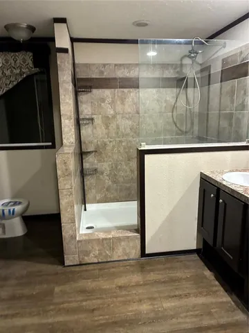 a view of a bathroom with a shower