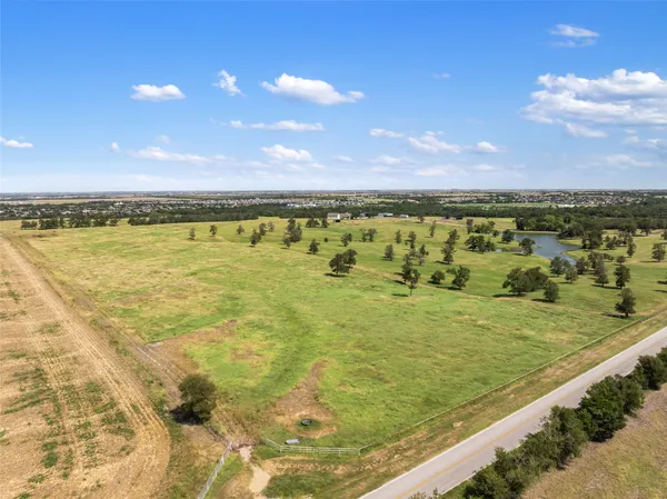 a view of an ocean and city