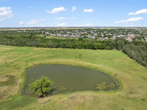 a view of an ocean and mountain
