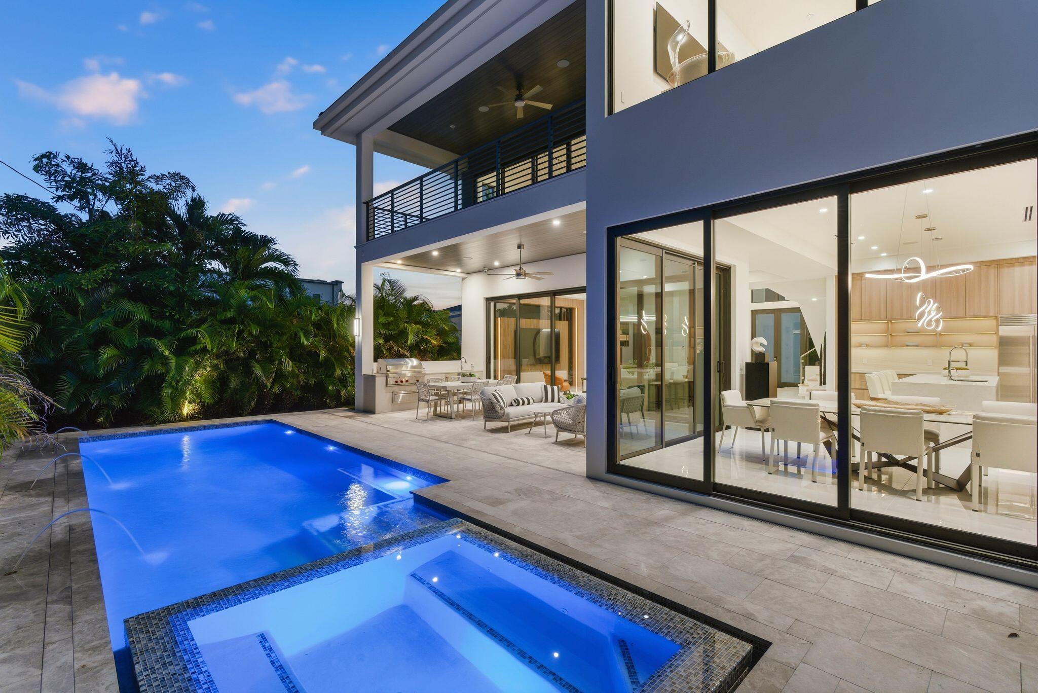 1050 Northeast 3rd Avenue Boca Raton, FL 33432 - Photo 19 of 63 a view of swimming pool with outdoor seating