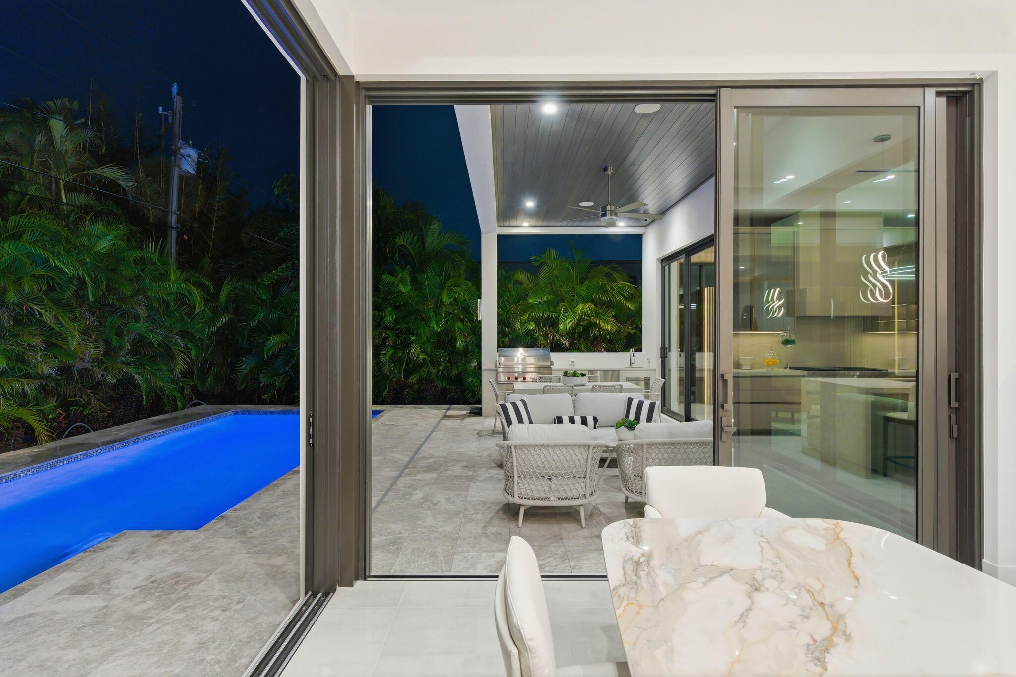 1050 Northeast 3rd Avenue Boca Raton, FL 33432 - Photo 22 of 63 a outdoor space with the view of the house