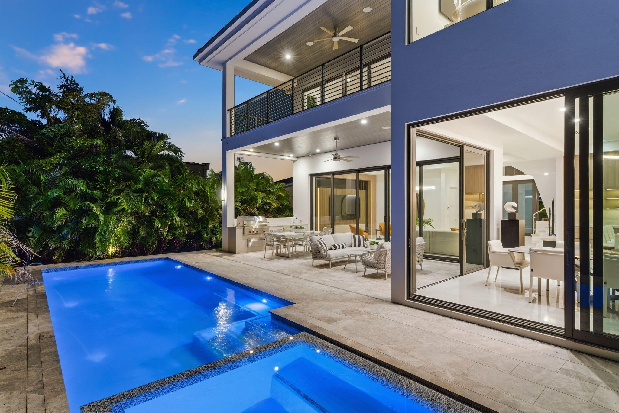 1050 Northeast 3rd Avenue Boca Raton, FL 33432 - Photo 23 of 63 a view of swimming pool with outdoor seating