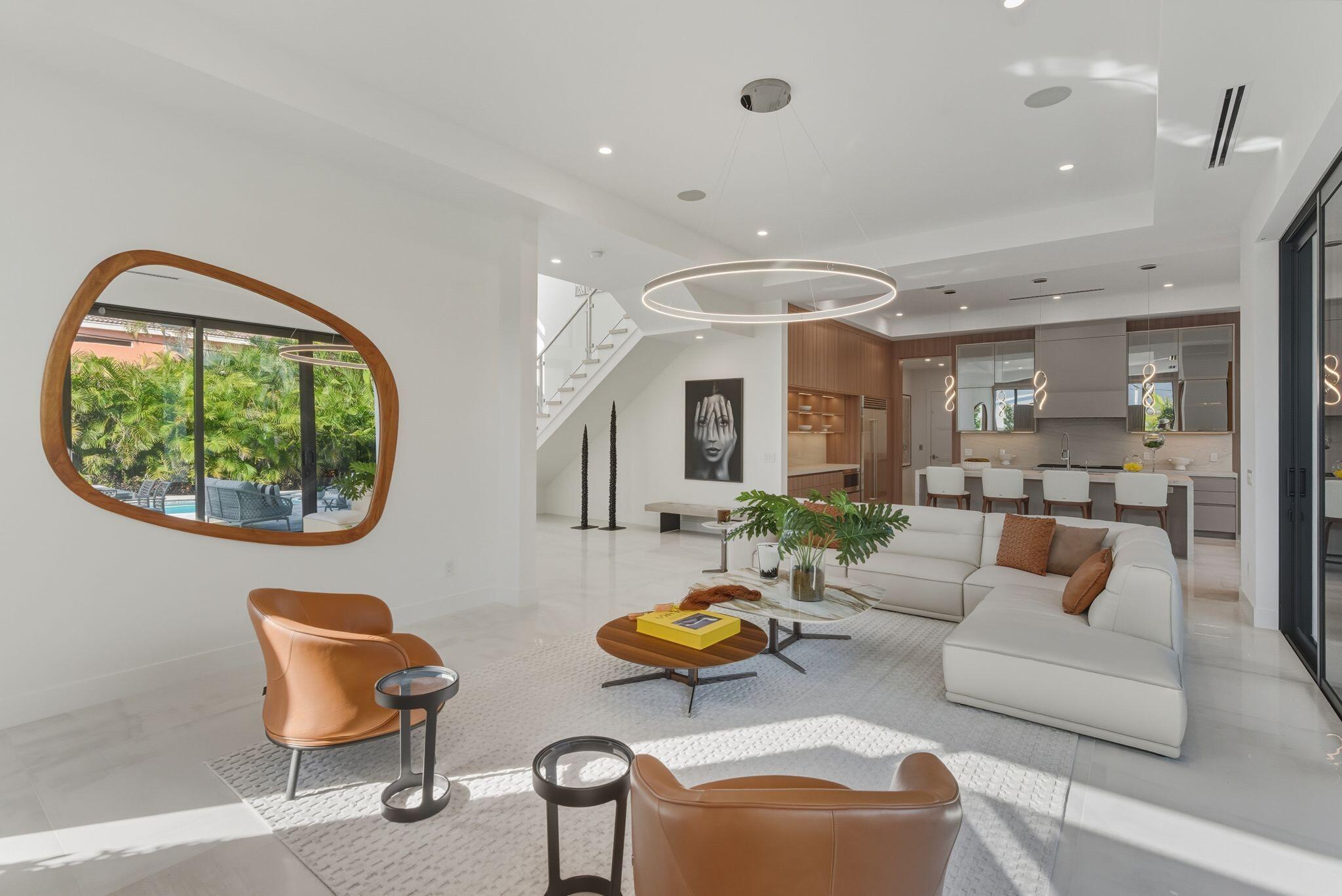 1050 Northeast 3rd Avenue Boca Raton, FL 33432 - Photo 30 of 63 a living room with furniture and a table