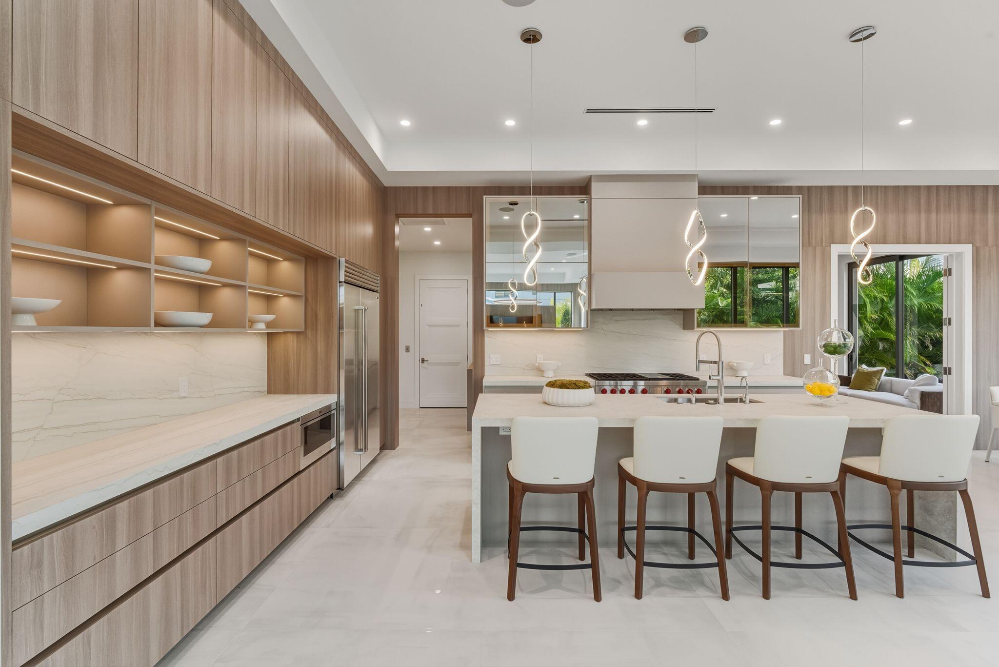 1050 Northeast 3rd Avenue Boca Raton, FL 33432 - Photo 33 of 63 a kitchen with a table and chairs