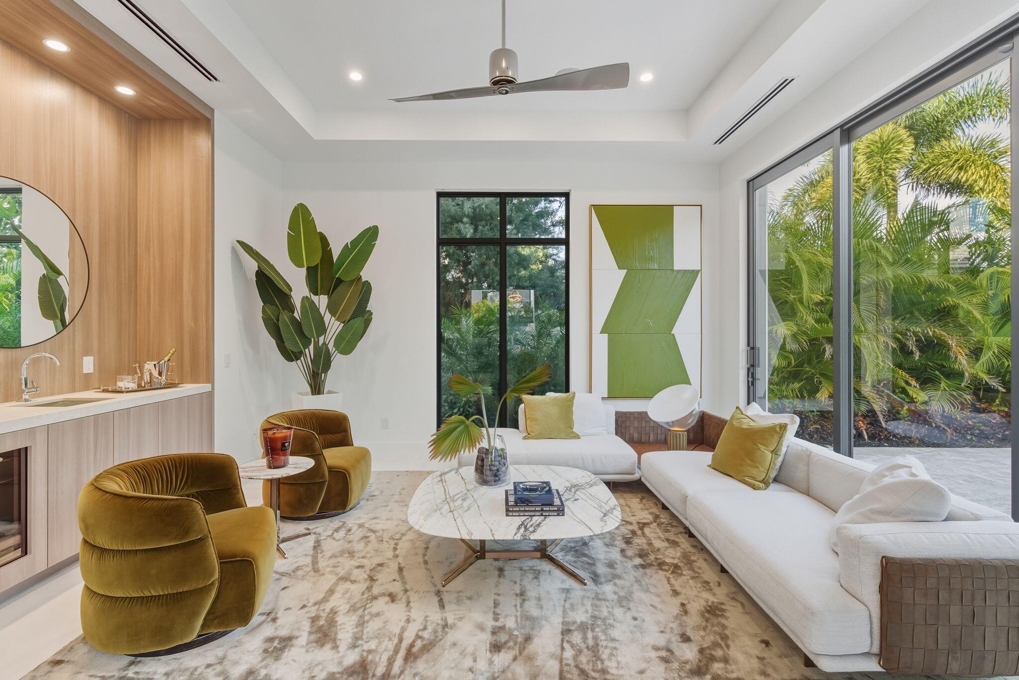 1050 Northeast 3rd Avenue Boca Raton, FL 33432 - Photo 38 of 63 a living room with furniture and a large window