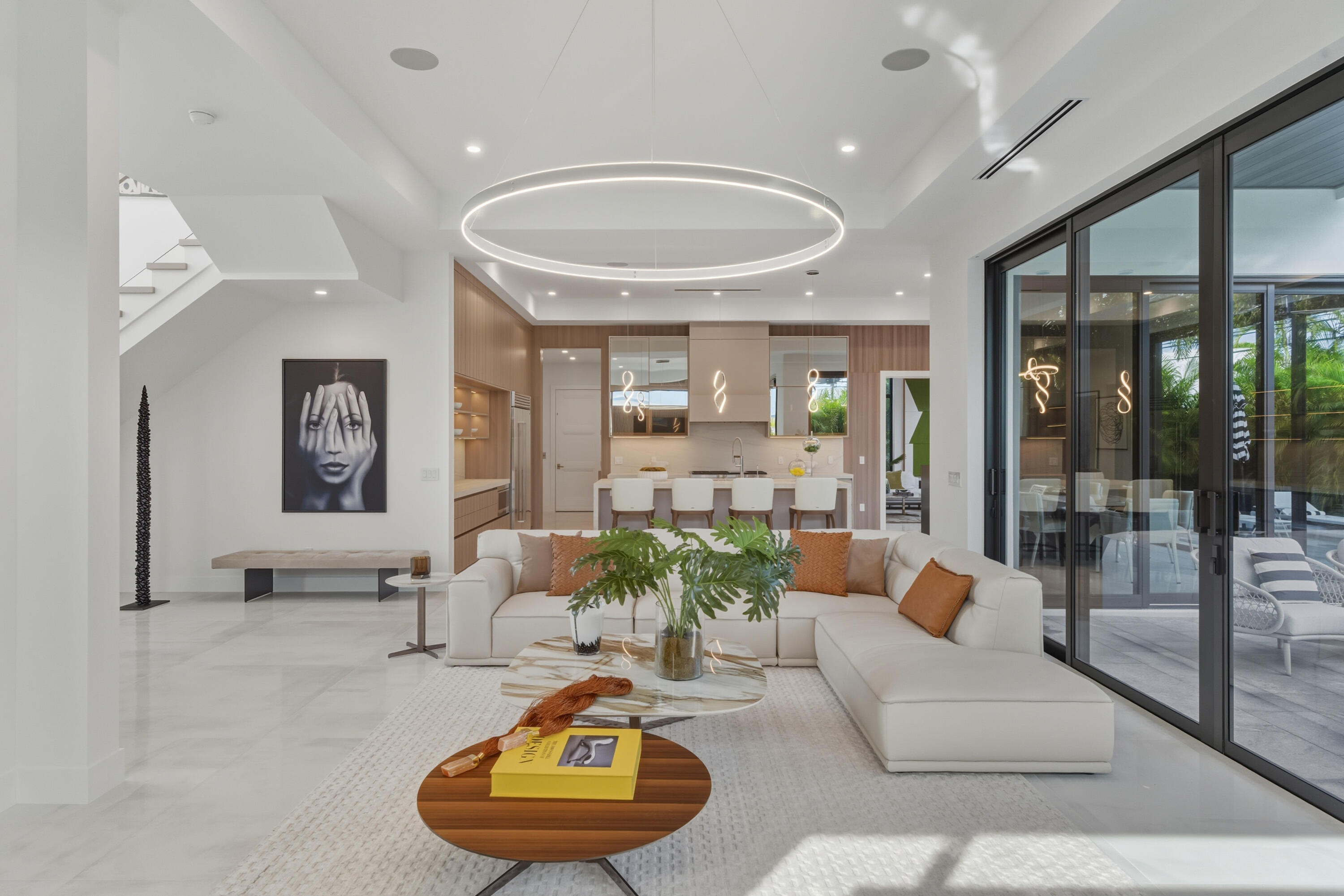 1050 Northeast 3rd Avenue Boca Raton, FL 33432 - Photo 4 of 63 a living room with furniture and a large window