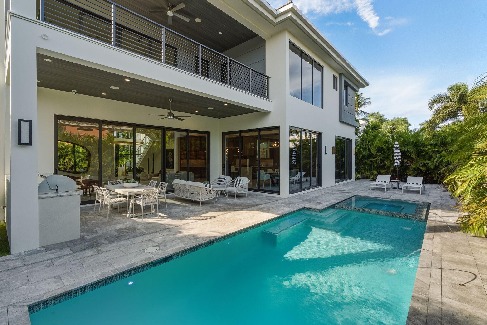 1050 Northeast 3rd Avenue Boca Raton, FL 33432 - Photo 41 of 63 a view of a house with sitting area and garden