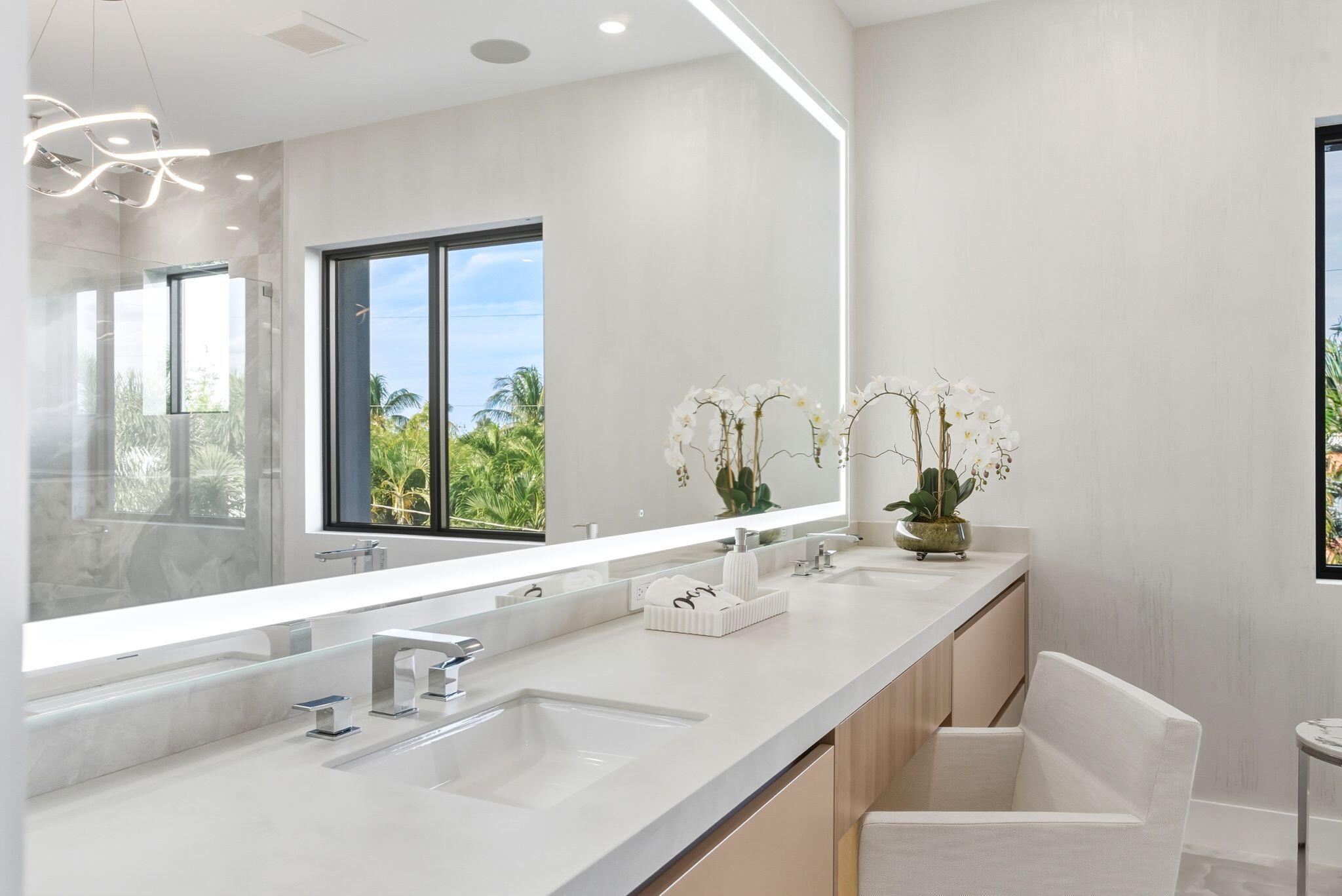 1050 Northeast 3rd Avenue Boca Raton, FL 33432 - Photo 60 of 63 a bathroom with a sink and a window