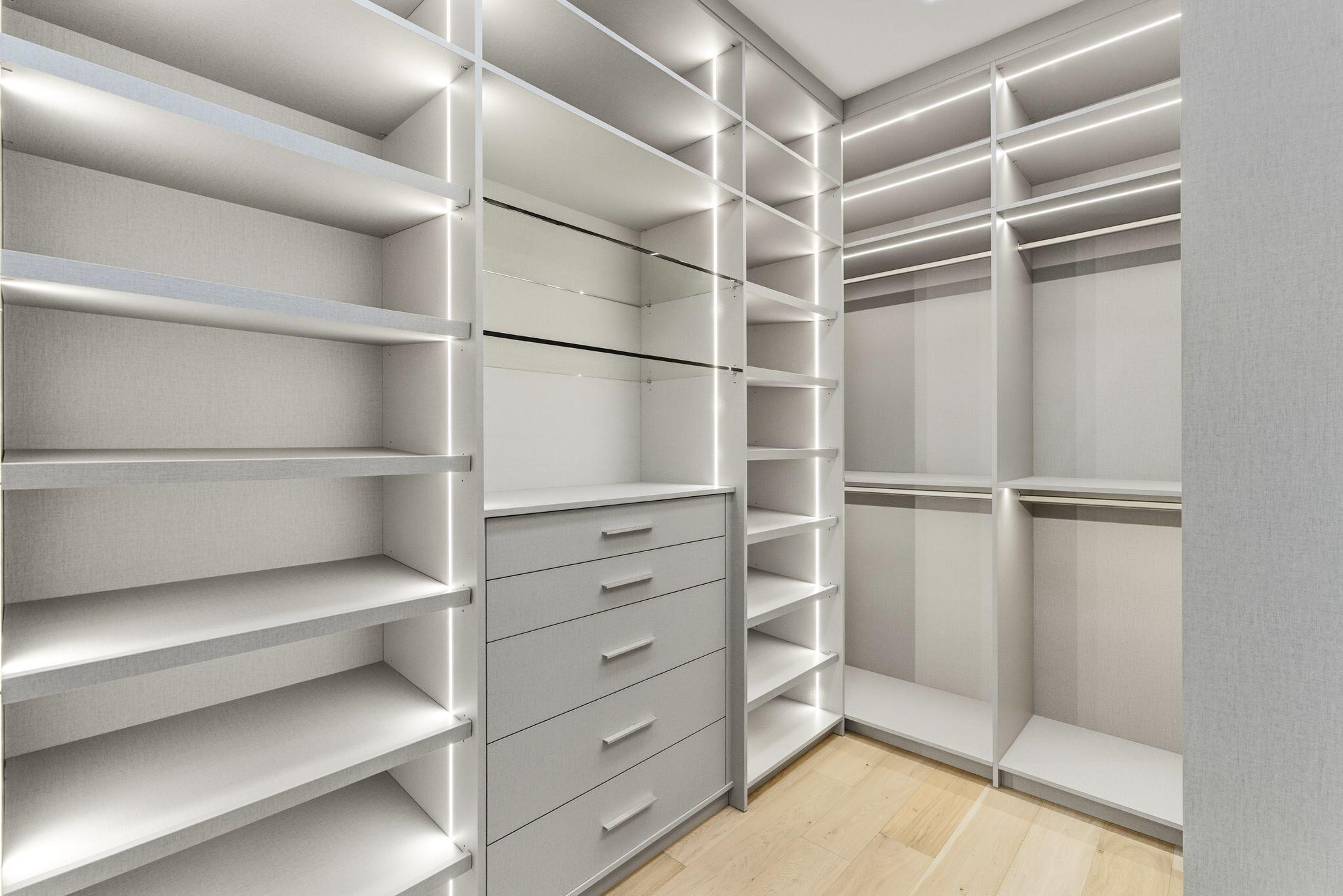 1050 Northeast 3rd Avenue Boca Raton, FL 33432 - Photo 61 of 63 a view of walk in closet with empty racks