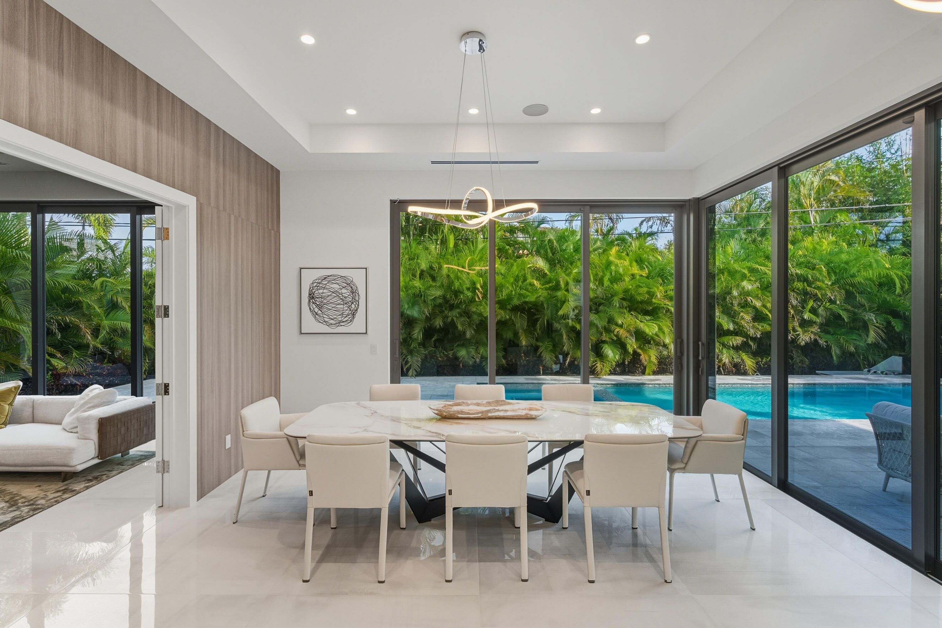 1050 Northeast 3rd Avenue Boca Raton, FL 33432 - Photo 7 of 63 a view of a dining room with furniture window and outside view
