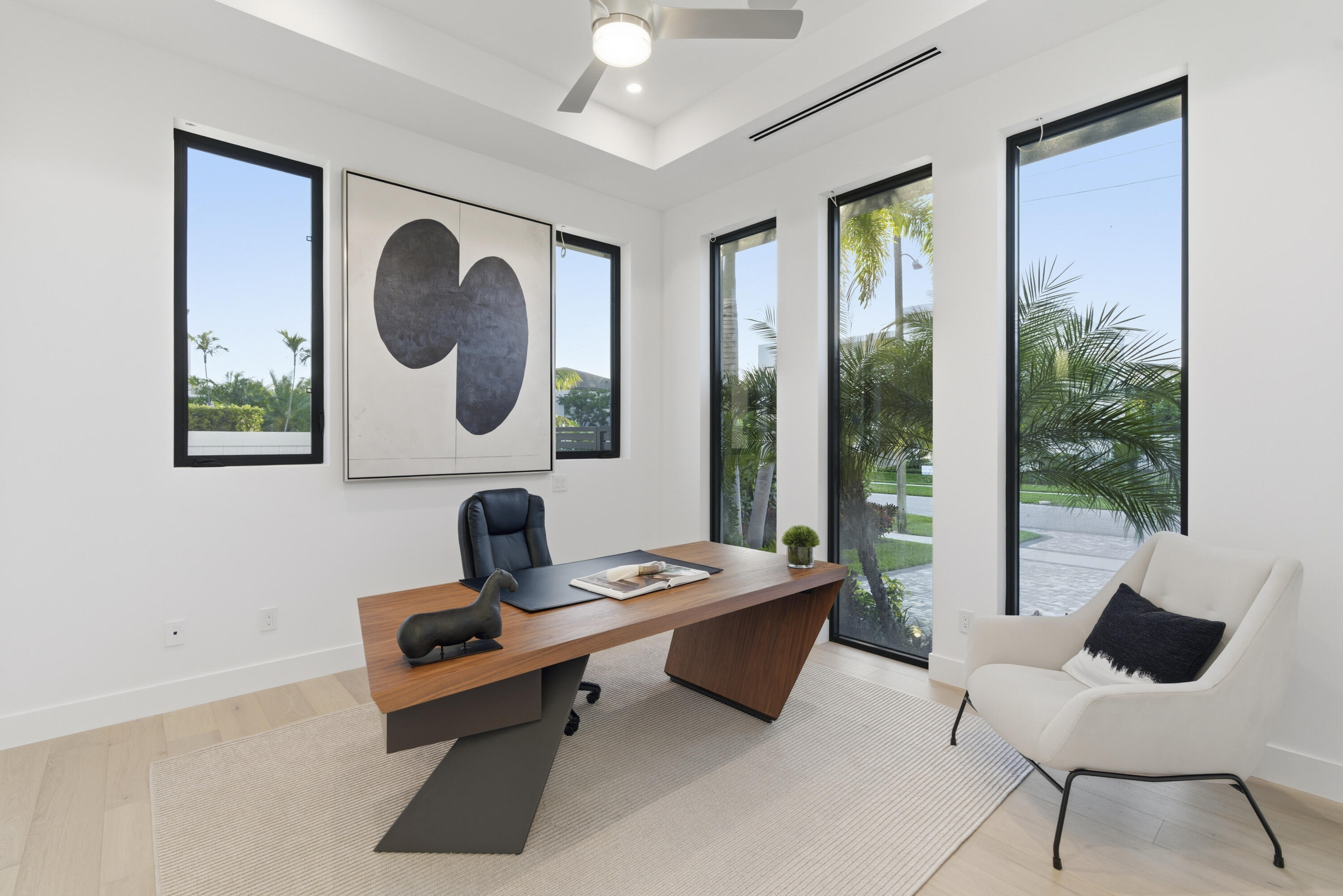 1050 Northeast 3rd Avenue Boca Raton, FL 33432 - Photo 10 of 63 a living room with furniture and a window