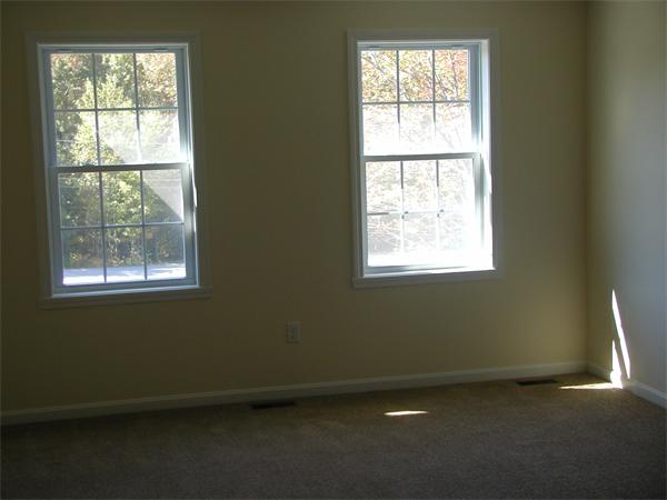143 Lowell Road Salem, NH 03079 - Photo 9 of 9 a view of an empty room with a window