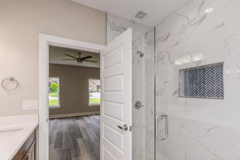 4540 Hermosa Road Crestview, FL 32539 - Photo 14 of 35 a view of a hallway view with wooden floor and staircase