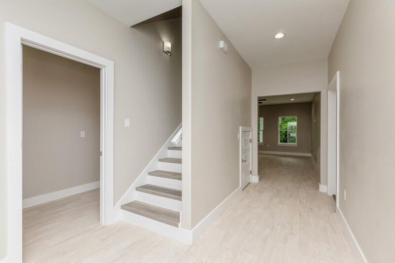 4540 Hermosa Road Crestview, FL 32539 - Photo 2 of 35 a view of an entryway with staircase