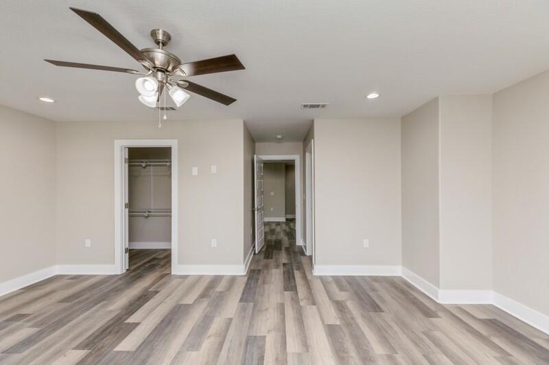 4540 Hermosa Road Crestview, FL 32539 - Photo 24 of 35 a view of an empty room and wooden floor