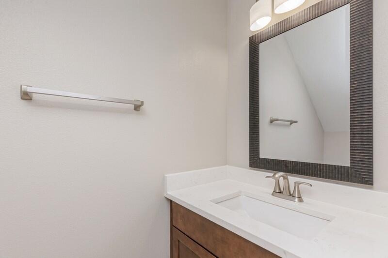 4540 Hermosa Road Crestview, FL 32539 - Photo 10 of 35 a bathroom with a sink and a mirror