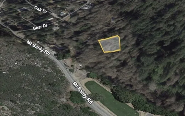 a view of a back yard of a house