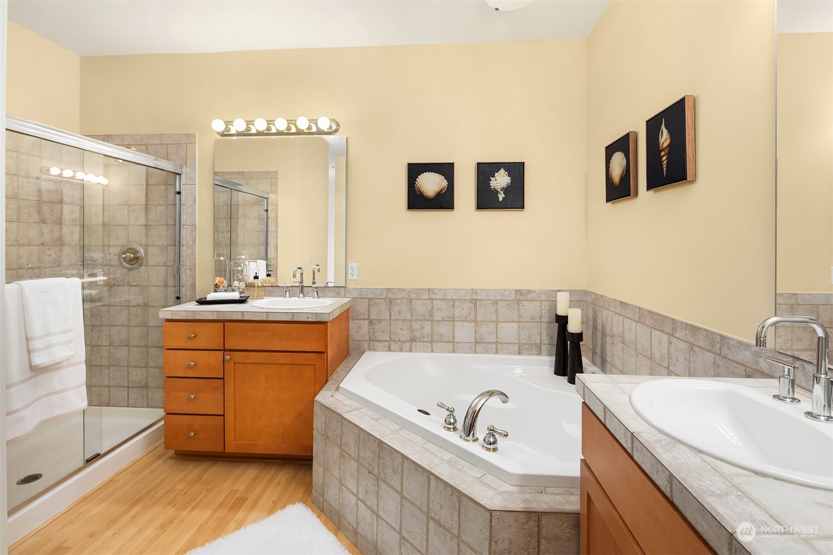 17432 Bothell Way Northeast, Unit B206 Bothell, WA 98011 - Photo 19 of 28 a bathroom with a tub sink and mirror