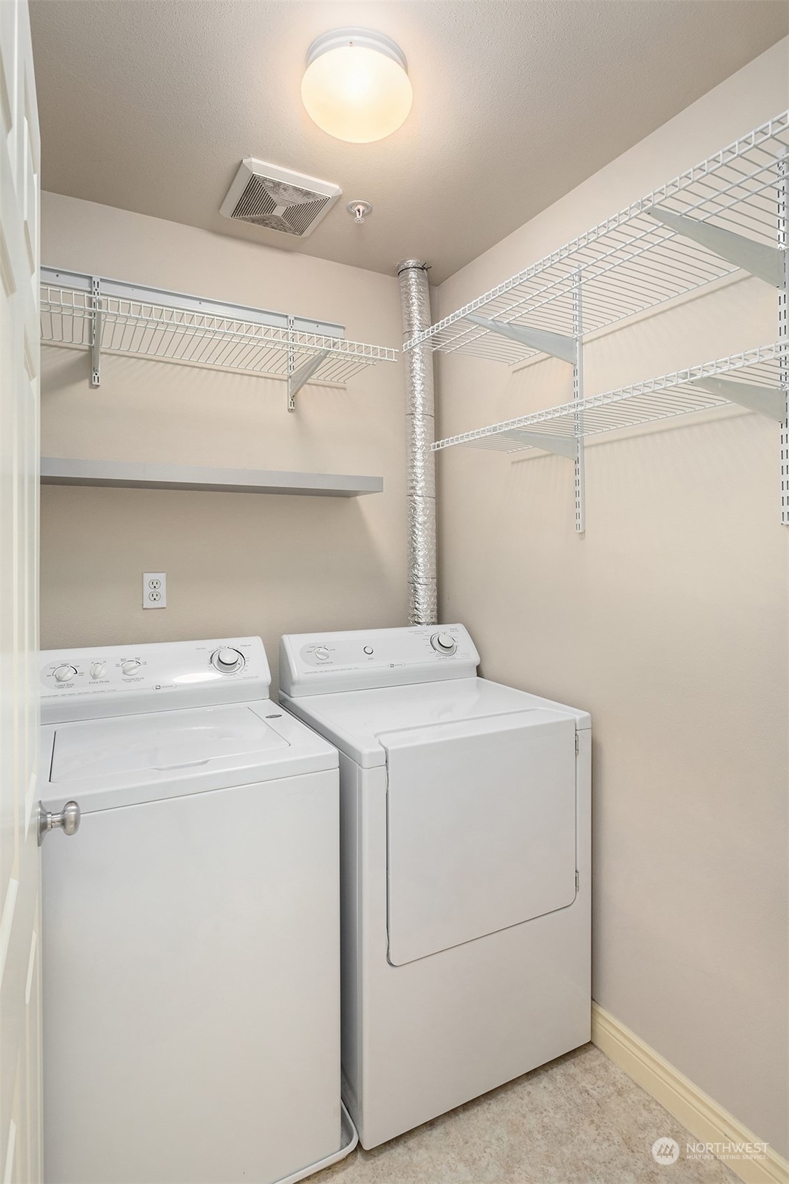 17432 Bothell Way Northeast, Unit B206 Bothell, WA 98011 - Photo 22 of 28 a utility room with dryer and washer