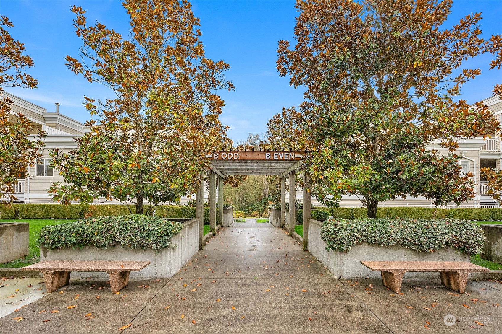 17432 Bothell Way Northeast, Unit B206 Bothell, WA 98011 - Photo 25 of 28 a view of a patio with table and chairs and potted plants