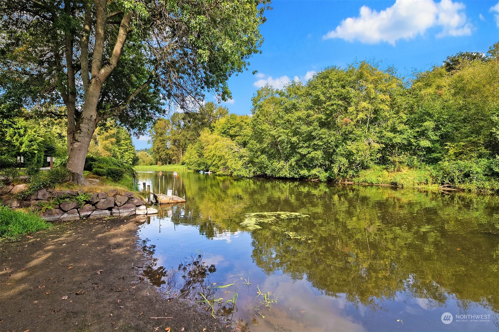 17432 Bothell Way Northeast, Unit B206 Bothell, WA 98011 - Photo 26 of 28 a view of a lake with houses
