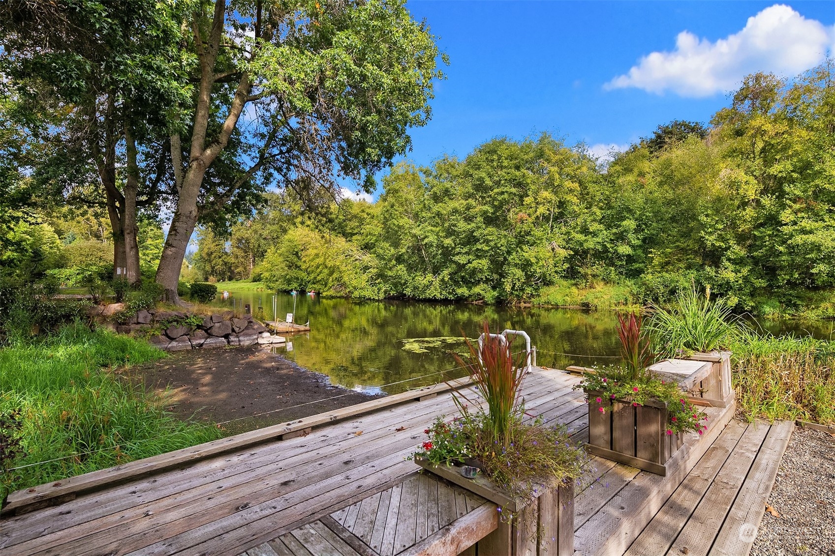 17432 Bothell Way Northeast, Unit B206 Bothell, WA 98011 - Photo 27 of 28 a view of a lake with a mountain view
