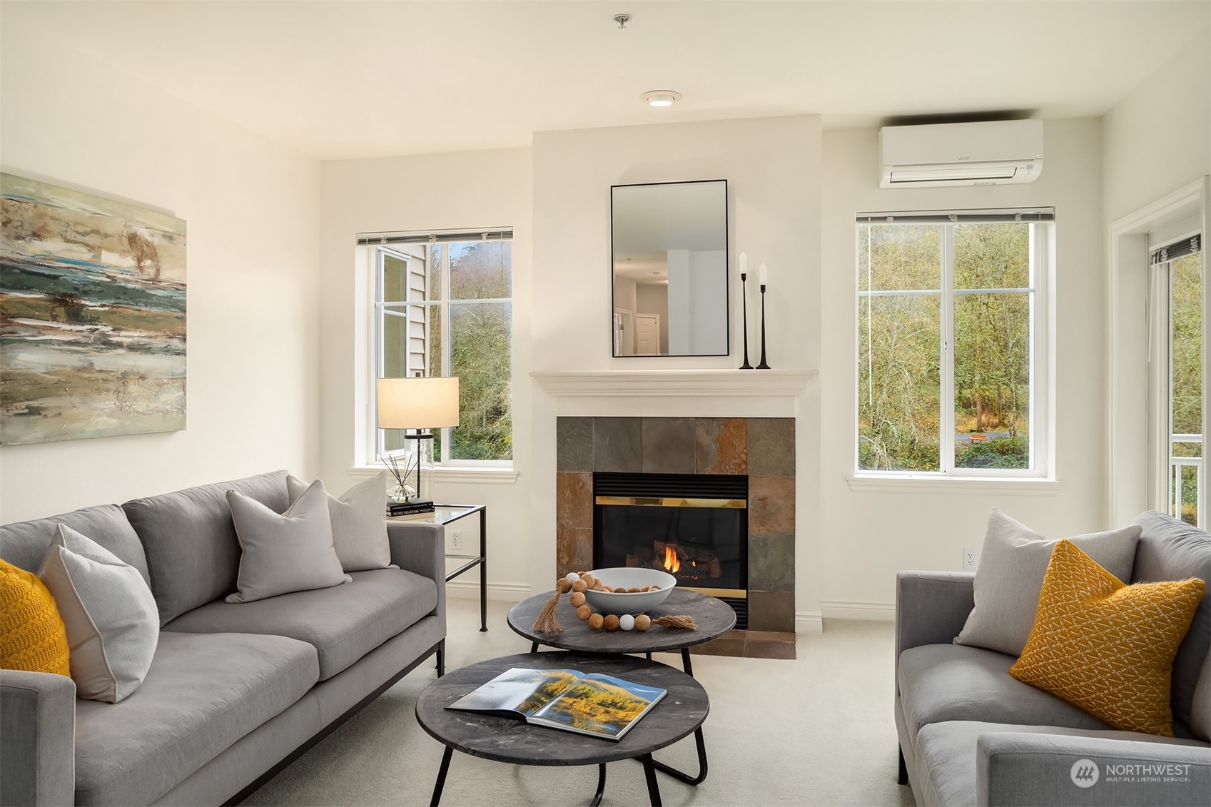 17432 Bothell Way Northeast, Unit B206 Bothell, WA 98011 - Photo 4 of 28 a living room with furniture and a fireplace