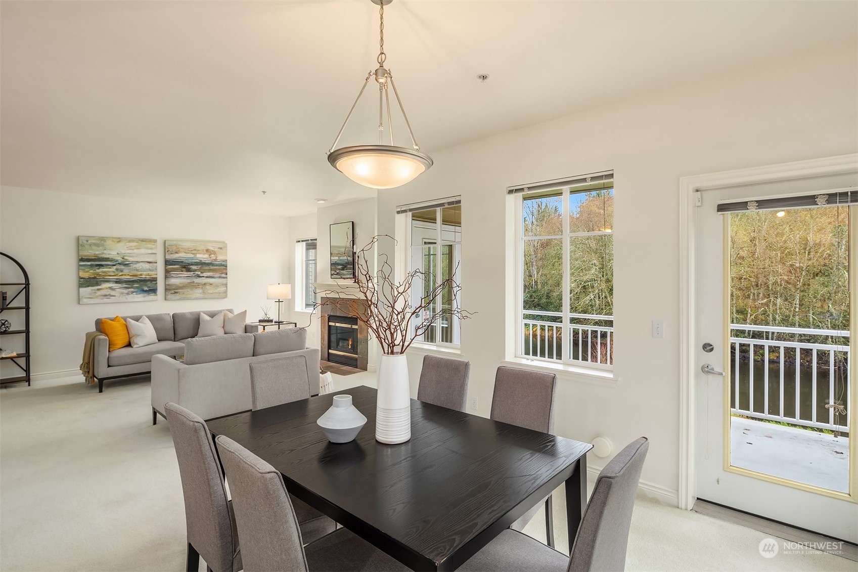 17432 Bothell Way Northeast, Unit B206 Bothell, WA 98011 - Photo 9 of 28 a view of a dining room with furniture window and outside view