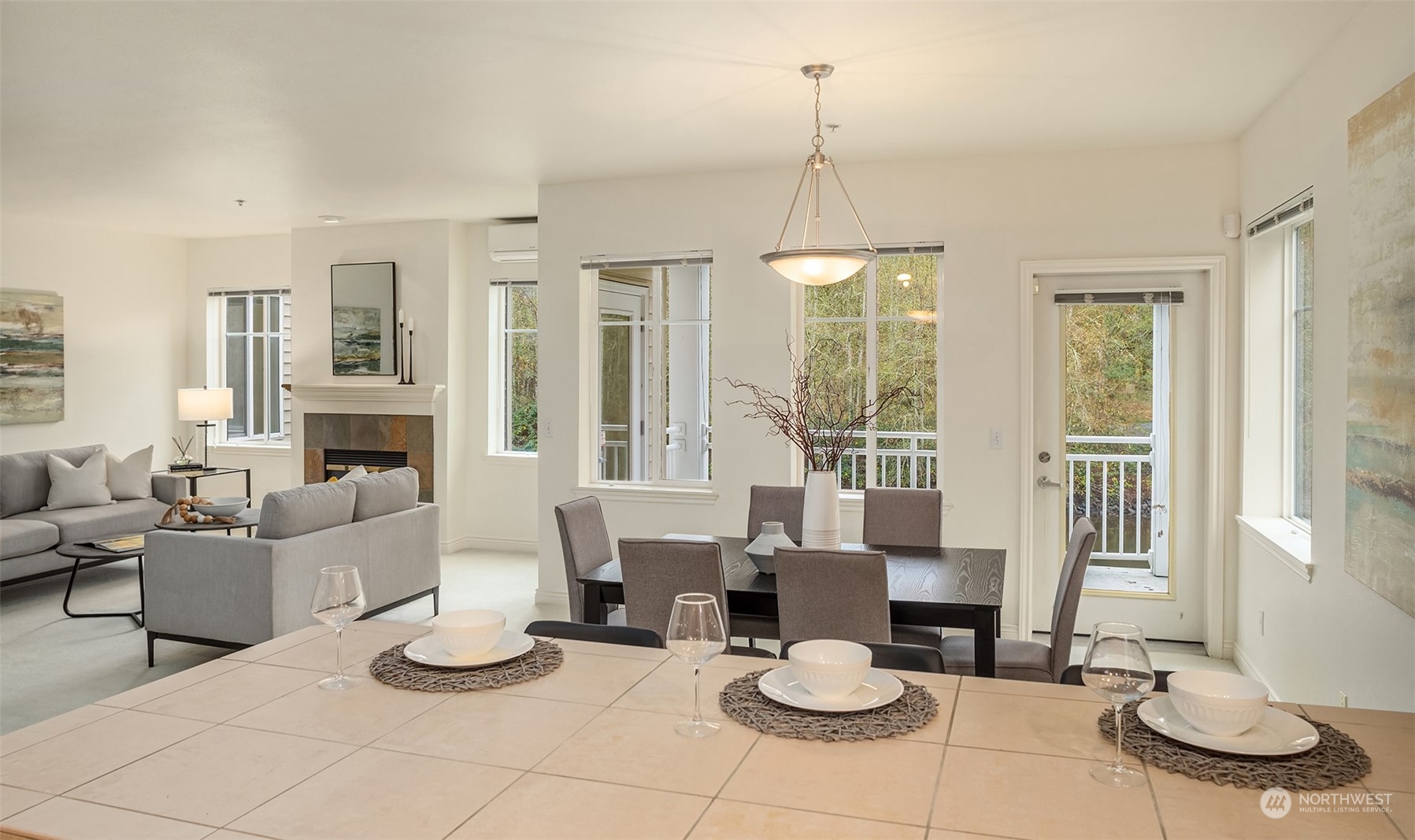 17432 Bothell Way Northeast, Unit B206 Bothell, WA 98011 - Photo 10 of 28 a living room with furniture and a fireplace