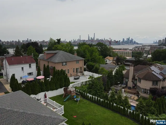 a view of a city in front of house