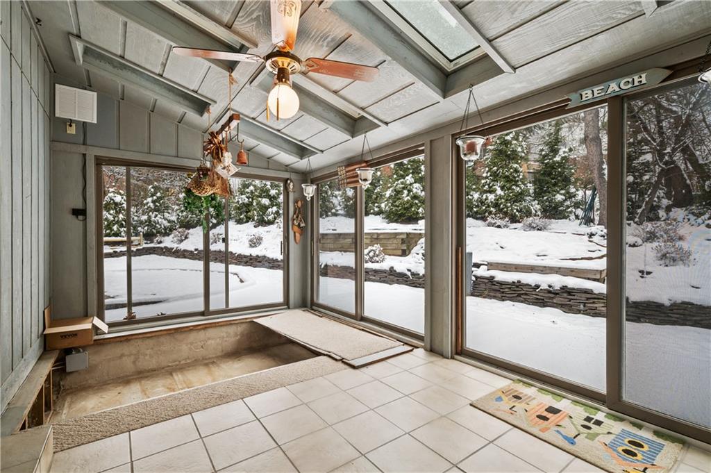 2272 Morrow Road Pittsburgh, PA 15241 - Photo 13 of 25 Enjoy thee sunroom. This room has space for a hot tub or can be used as an extra room.