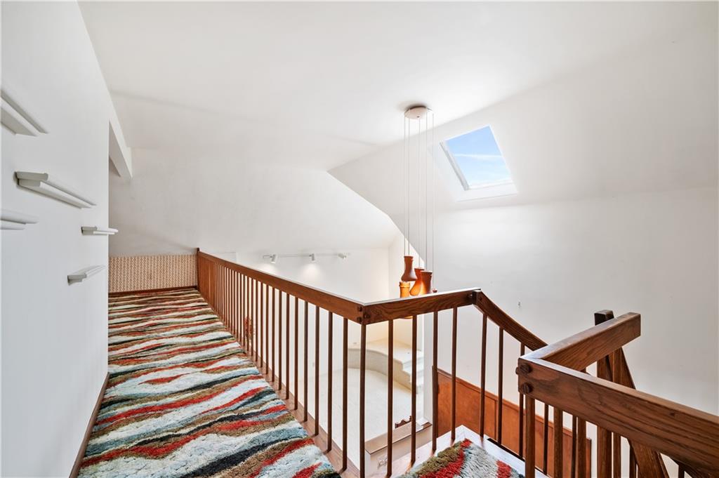 2272 Morrow Road Pittsburgh, PA 15241 - Photo 14 of 25 Balcony from the helix staircase and walkway to the loft area. Sky lights can be seen in the entry way and loft area.