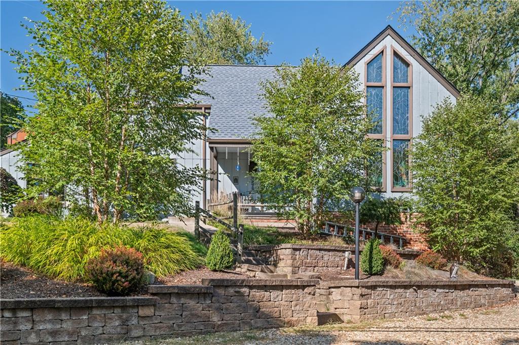 2272 Morrow Road Pittsburgh, PA 15241 - Photo 19 of 25 Summertime house picture when the trees and bushes are in bloom.