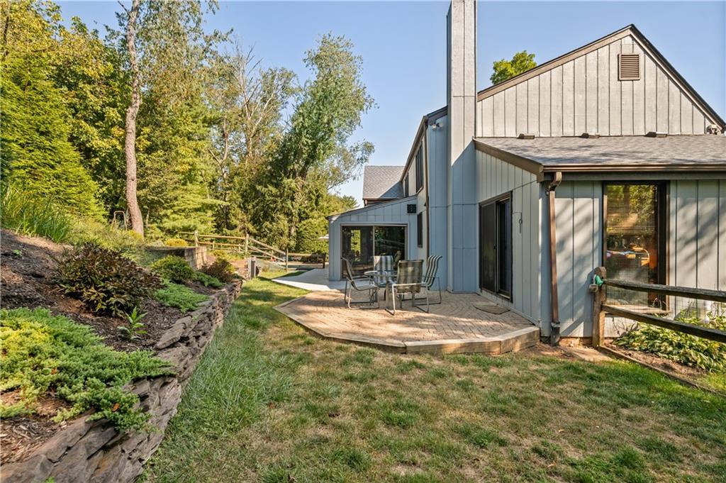 2272 Morrow Road Pittsburgh, PA 15241 - Photo 20 of 25 Side of structure, with easy access from the first-floor family room, kitchen and first floor laundry. Oversized patio and easy access to the fenced in side yard.
