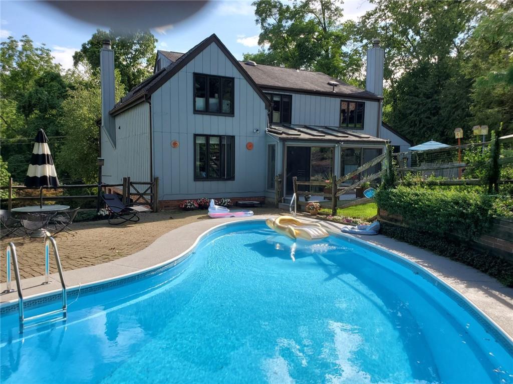 2272 Morrow Road Pittsburgh, PA 15241 - Photo 4 of 25 WOW! Check out this beautiful kidney shaped pool. The seller is leaving all of the pool equipment and necessities for this beautiful pool in the spacious garage area. Think Summer 2026.