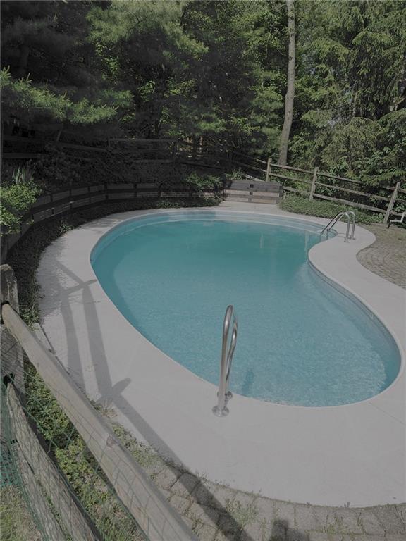 2272 Morrow Road Pittsburgh, PA 15241 - Photo 5 of 25 Another photo of the kidney shape pool in the tree-lined backyard for your privacy. Your stay at home "stay-cation" for the Summer of 2026.