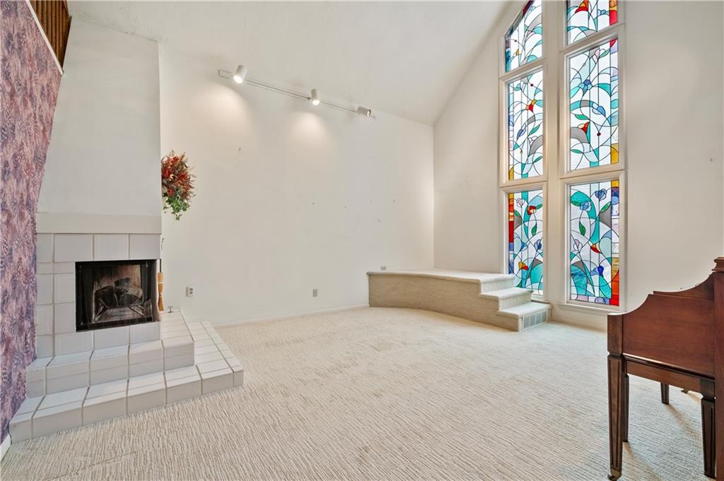 2272 Morrow Road Pittsburgh, PA 15241 - Photo 7 of 25 Over-size living room with two soaring stained-glass windows.