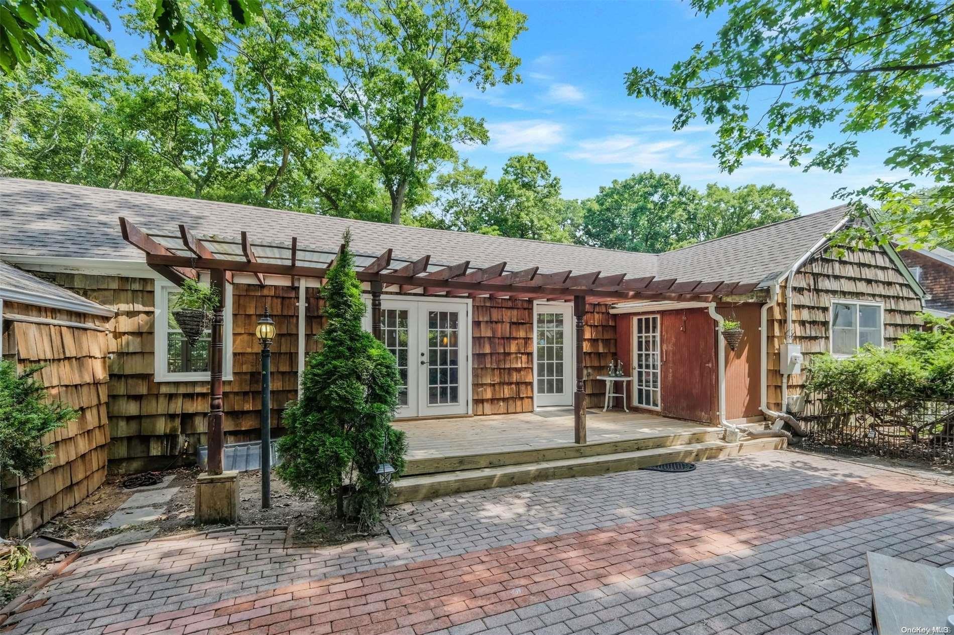 7 Hillside Road Stony Brook, NY 11790 - Photo 1 of 1 a view of a house with a yard