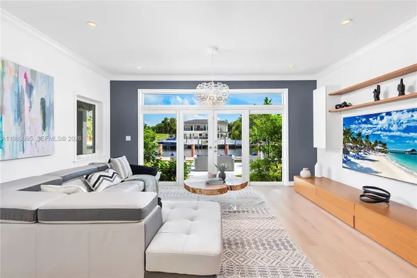 a large living room with large windows