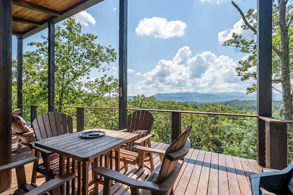 220 Firefly Road Blue Ridge, GA 30513 - Photo 54 of 71 a view of a balcony with furniture