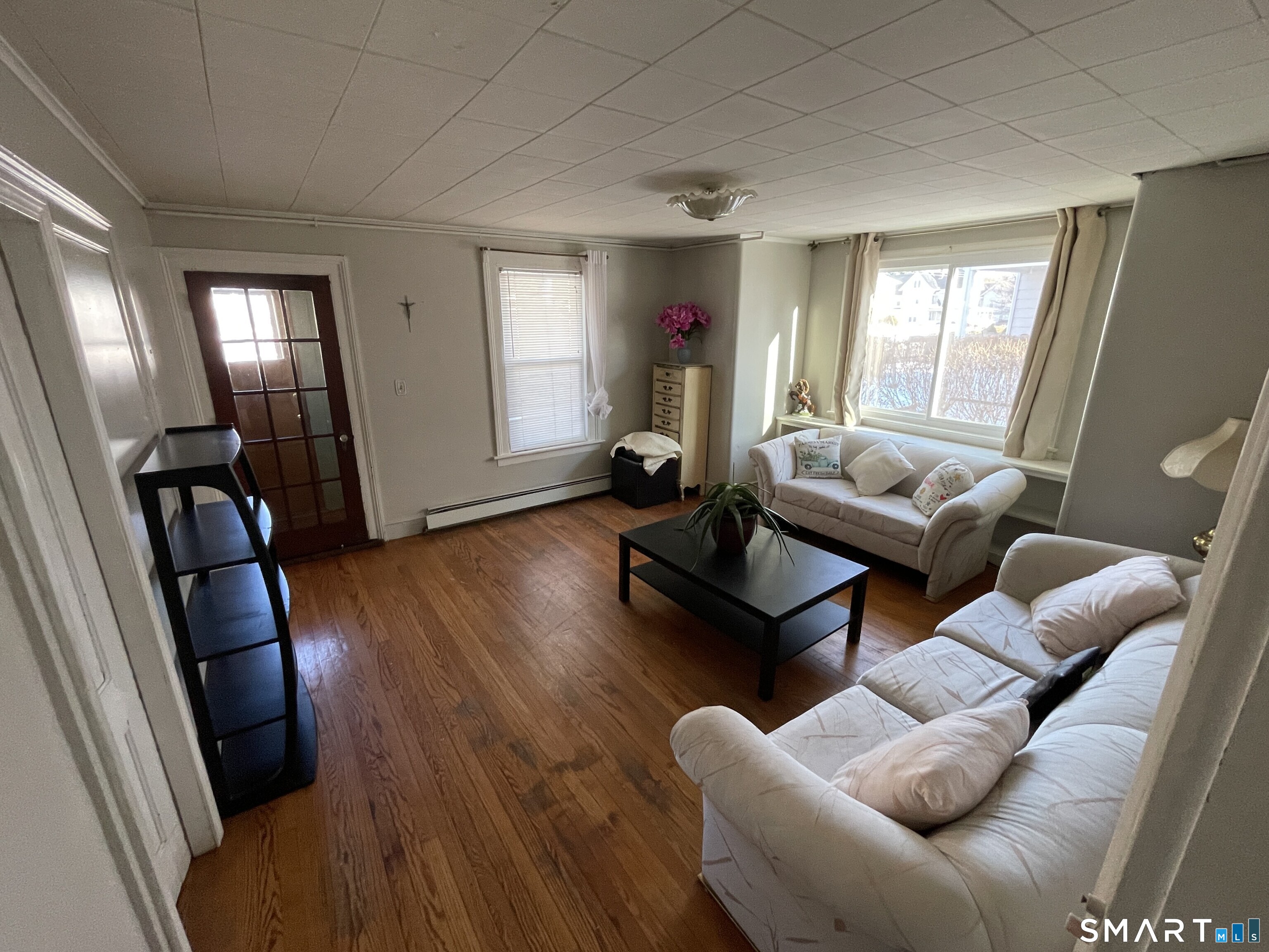 264 South Main Street Torrington, CT 06790 - Photo 14 of 39 a living room with furniture and wooden floor