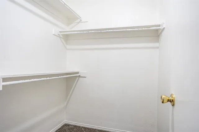 a bathroom with a bathtub and toilet